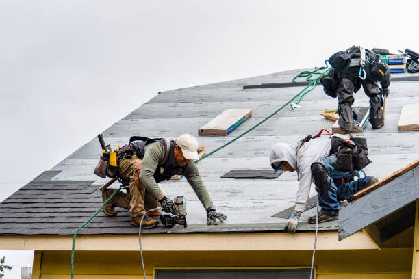 Professional Gutter Installation technician working in Lake Oswego, OR